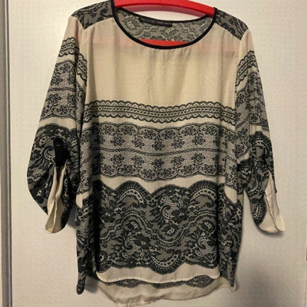 Zara blouse with lace print.